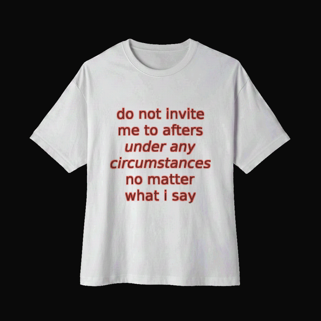 White Bella+Canvas 3010 oversized boxy tee on a near-black studio backdrop, coral italic print reading do not invite me to afters under any circumstances no matter what i say