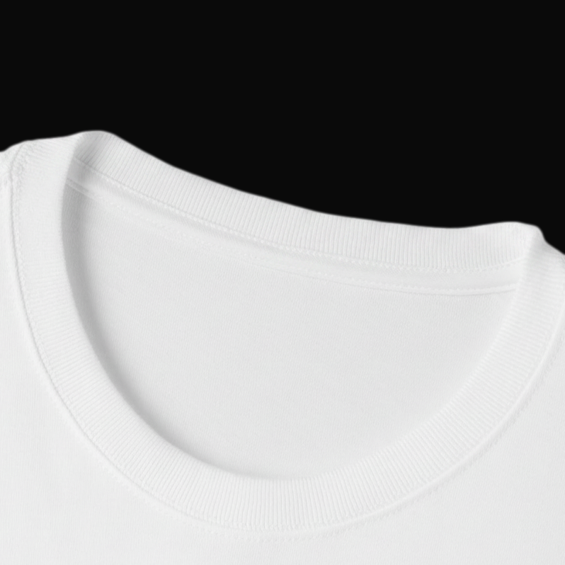 Close-up of the ribbed crew collar and shoulder seam on the white oversized boxy tee